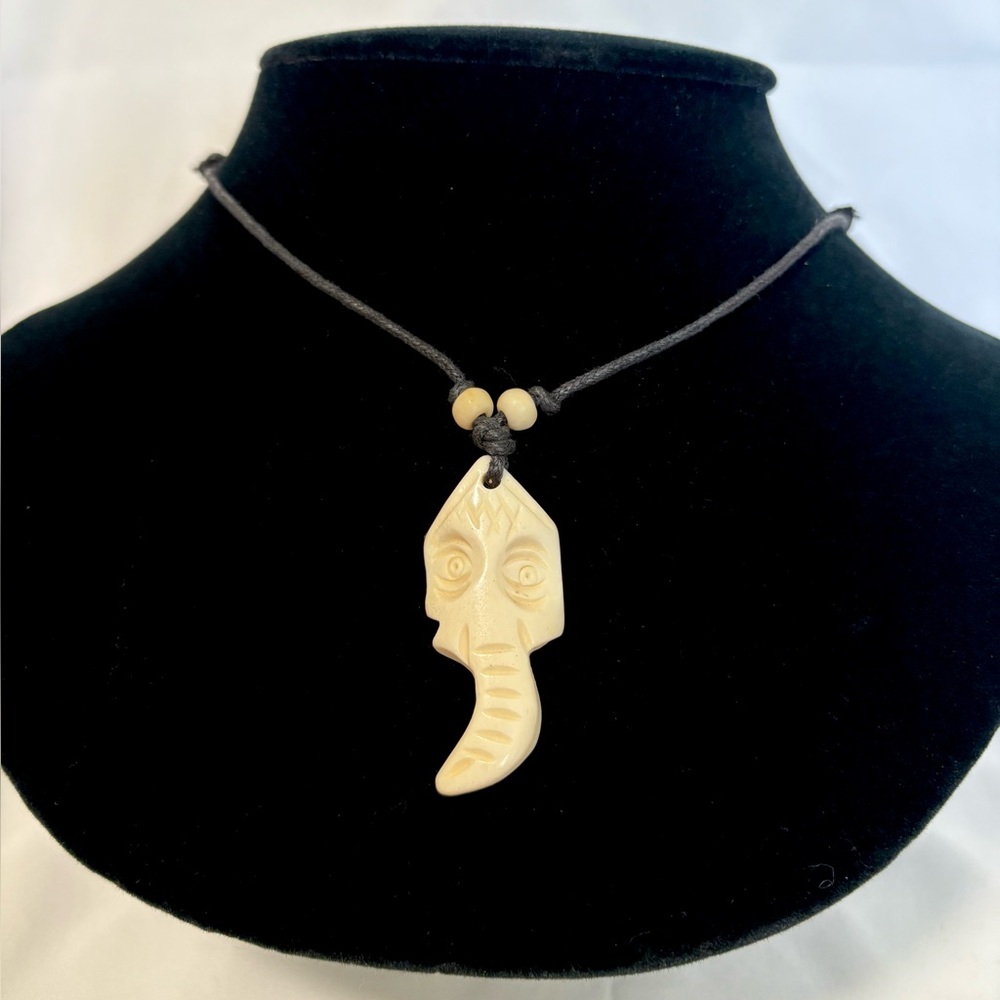 Lucky elephant bone carved pendent necklace.